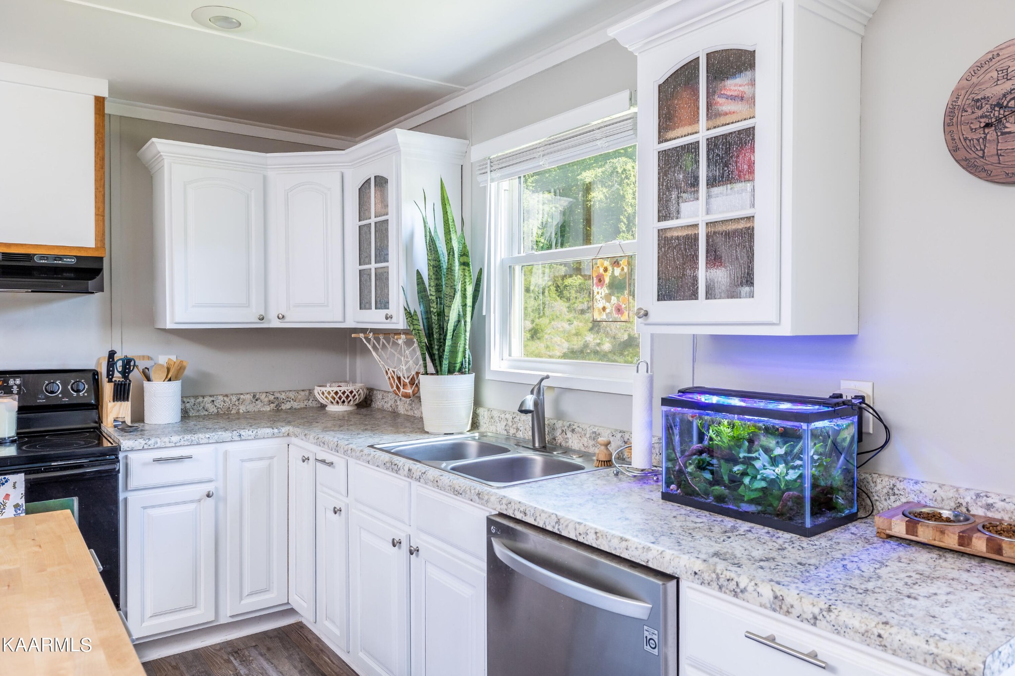 117 Jarrett Lane Oak Ridge, TN 37830 - Photo 11 of 35 a kitchen with stainless steel appliances granite countertop a sink a stove and a window