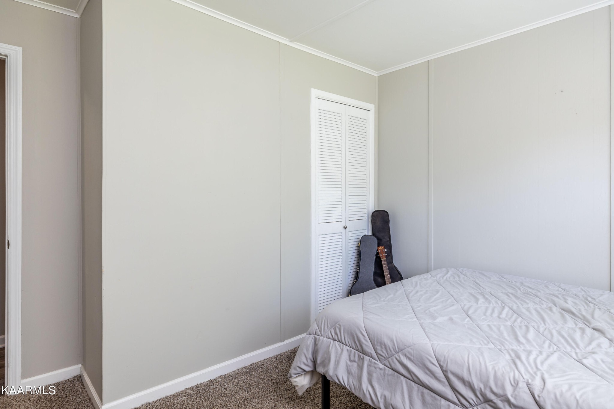 117 Jarrett Lane Oak Ridge, TN 37830 - Photo 21 of 35 a bedroom with a bed and a window