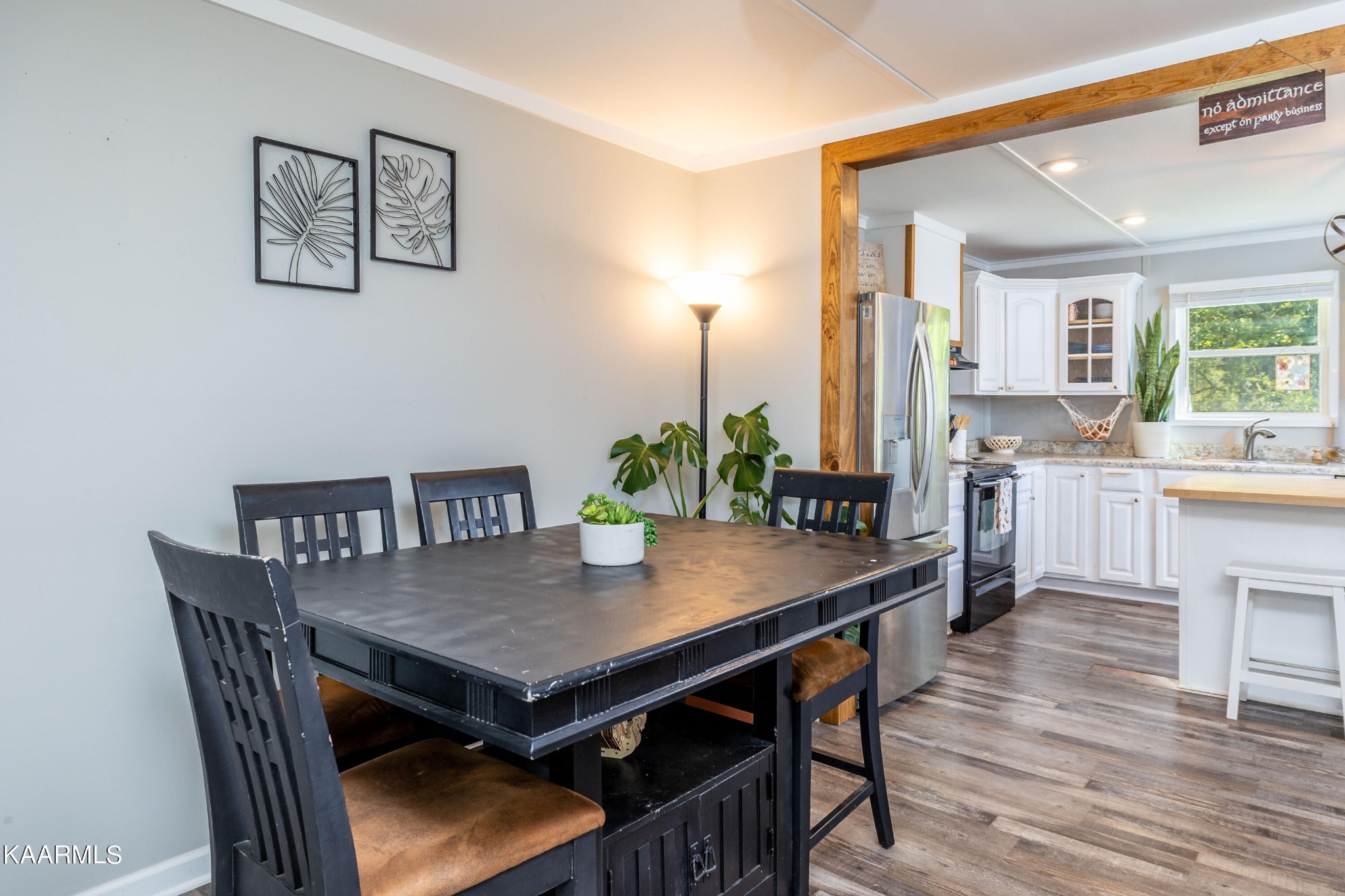 117 Jarrett Lane Oak Ridge, TN 37830 - Photo 7 of 35 a view of a dining room with furniture and wooden floor