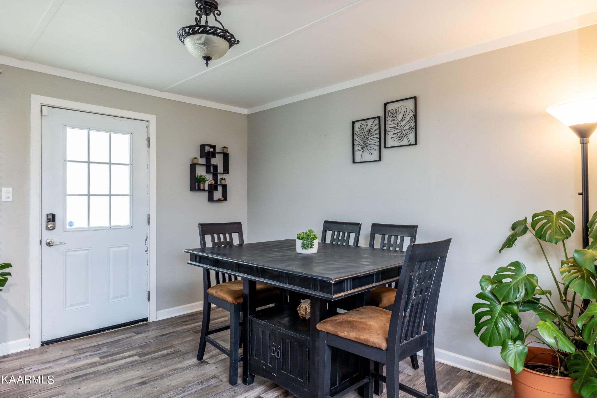 117 Jarrett Lane Oak Ridge, TN 37830 - Photo 9 of 35 a view of a dining room with furniture window and wooden floor