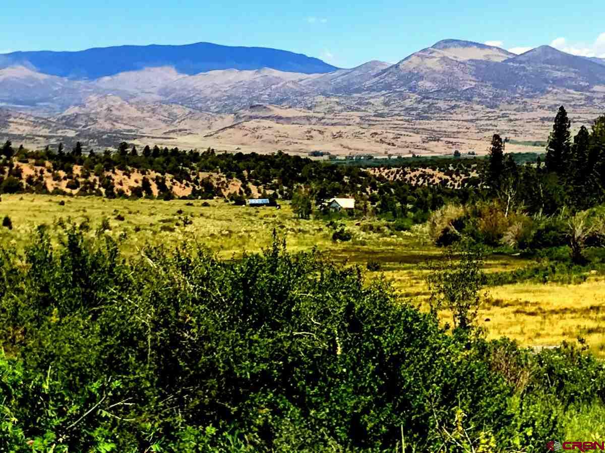 a view of lake with mountain