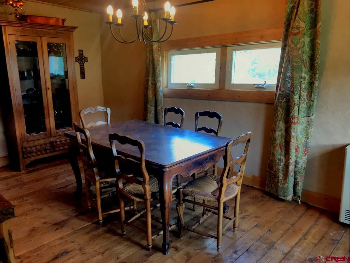 Tbd Shaw Creek Ranch Road Del Norte, CO 81132 - Photo 7 of 35 a view of a dining room with furniture and window