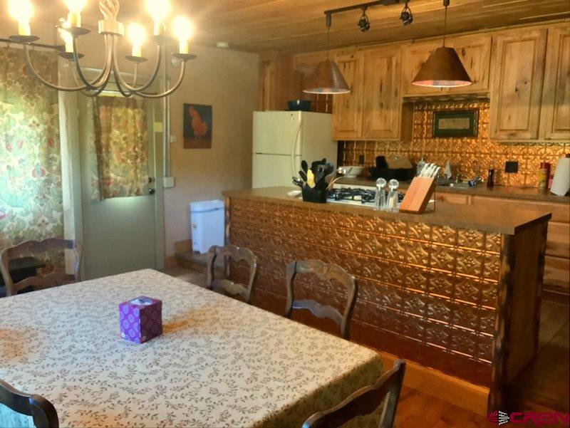 Tbd Shaw Creek Ranch Road Del Norte, CO 81132 - Photo 10 of 35 a view of a dining room with furniture