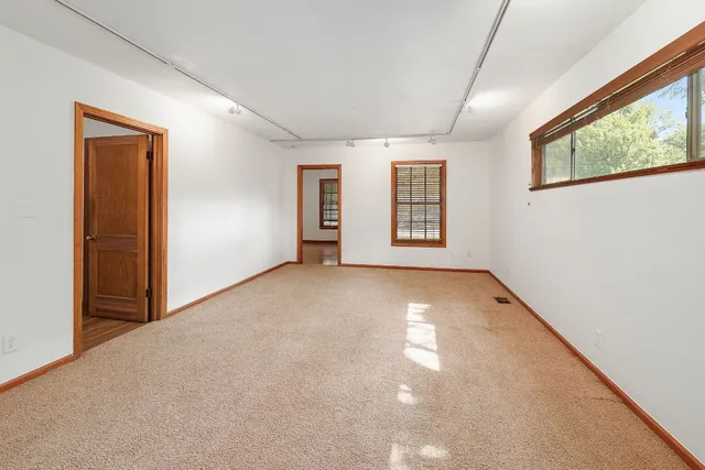 an empty room with windows