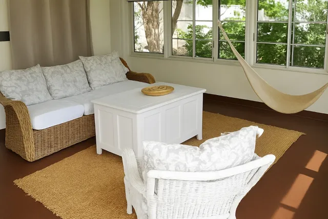 a living room with furniture and a window