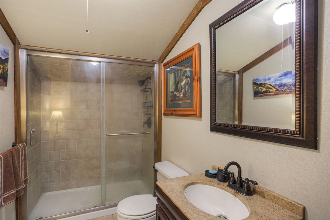 73 Mid Land Avenue Hartsel, CO 80449 - Photo 16 of 31 a bathroom with a shower and sink