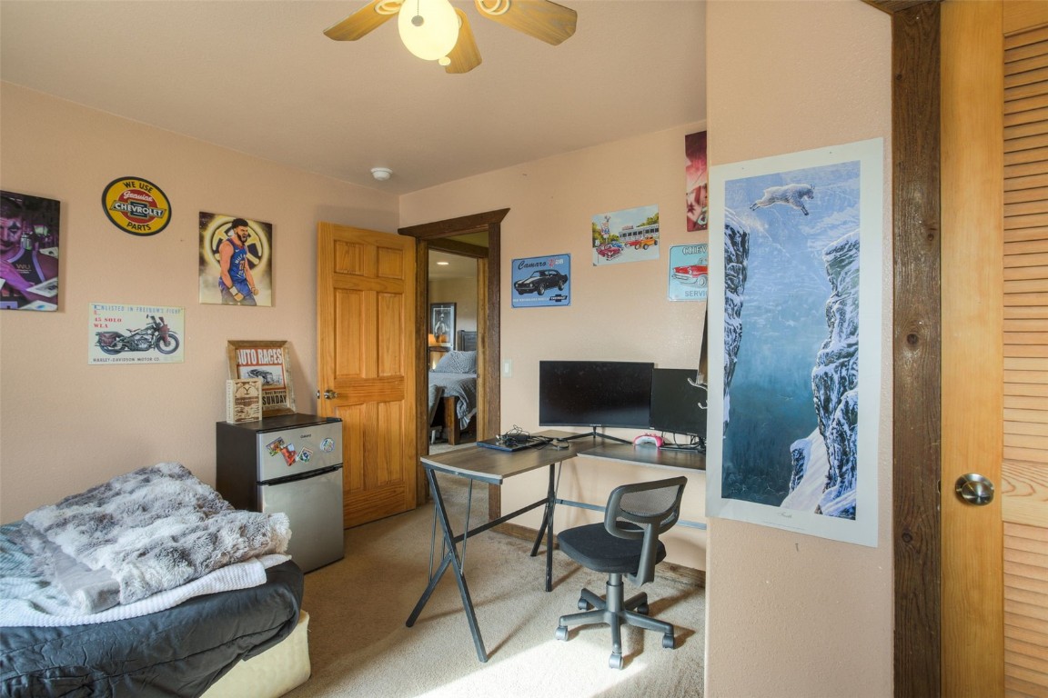 73 Mid Land Avenue Hartsel, CO 80449 - Photo 18 of 31 a living room with furniture and a flat screen tv