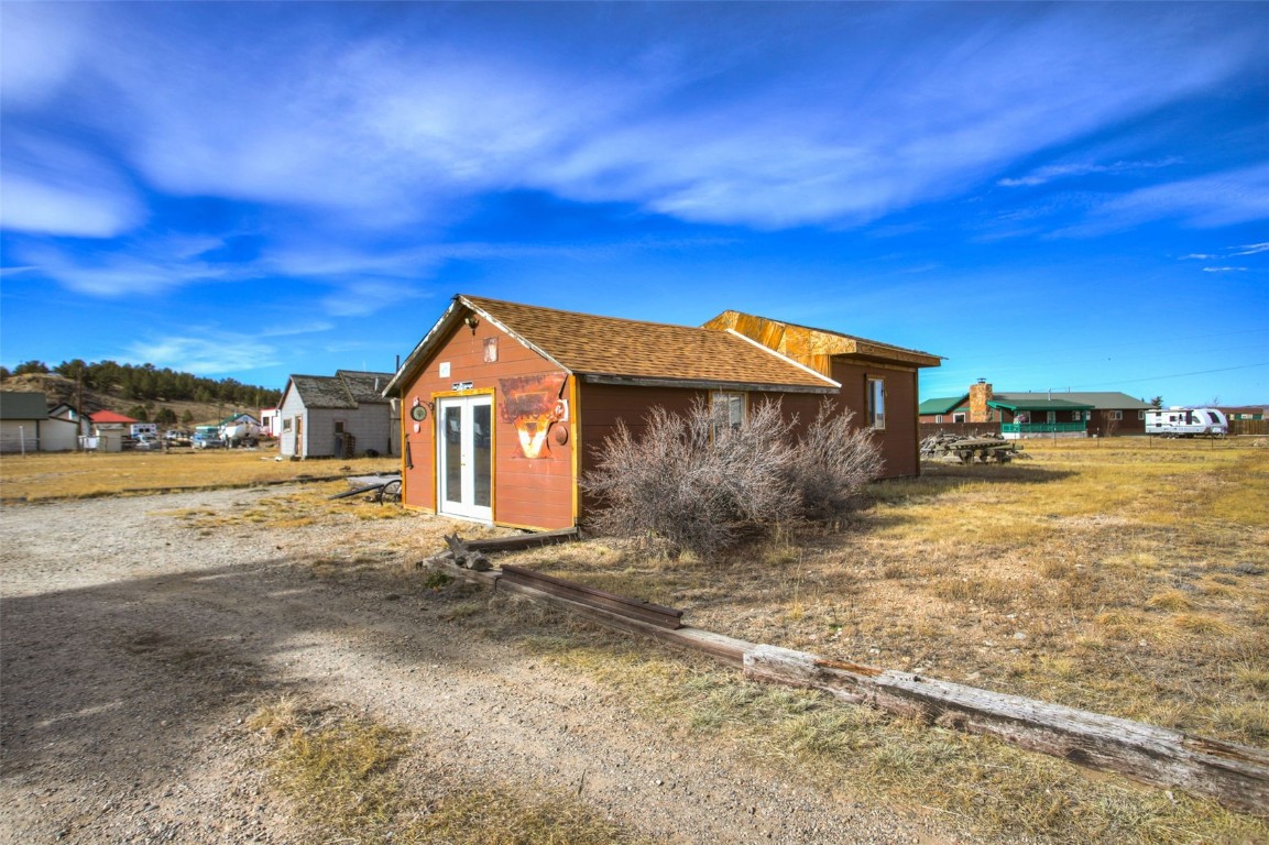 73 Mid Land Avenue Hartsel, CO 80449 - Photo 25 of 31 a view of a house with a yard