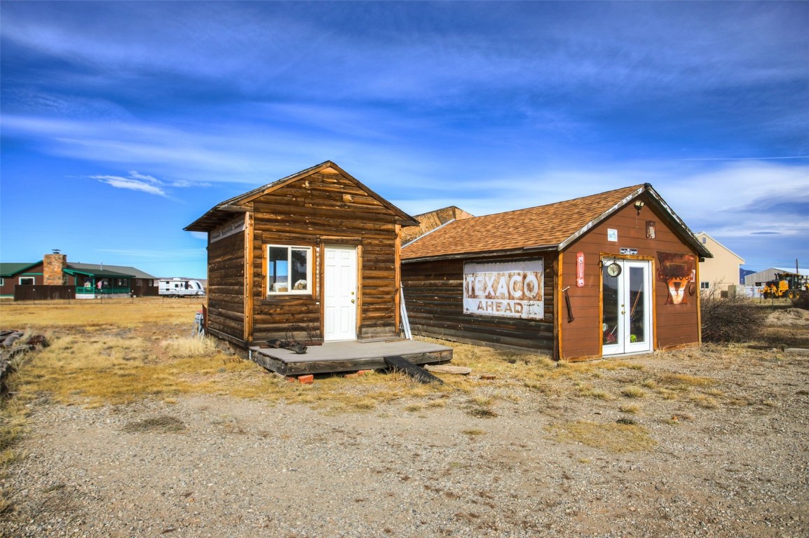 73 Mid Land Avenue Hartsel, CO 80449 - Photo 29 of 31 a front view of a house with a yard