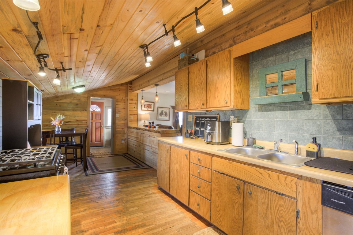 73 Mid Land Avenue Hartsel, CO 80449 - Photo 7 of 31 a kitchen with stainless steel appliances granite countertop a sink and cabinets