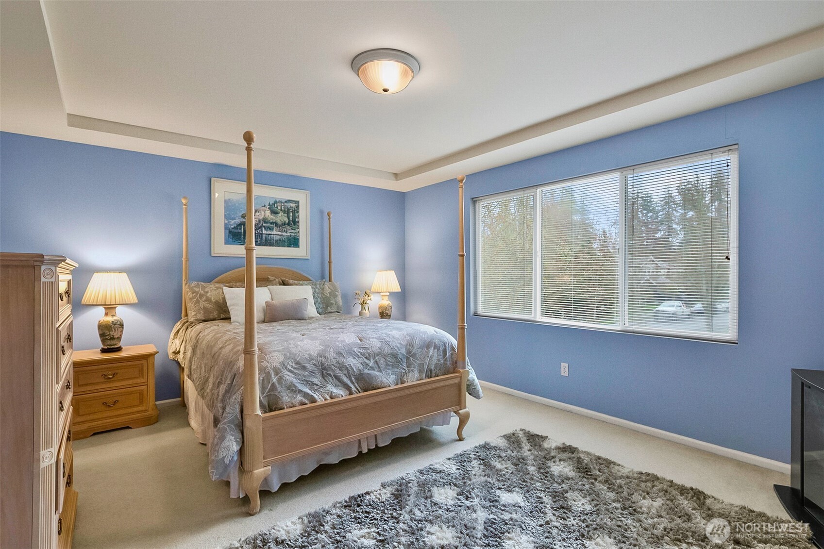 17401 33rd Drive Southeast Bothell, WA 98012 - Photo 23 of 39 a bedroom with a bed and wooden floor