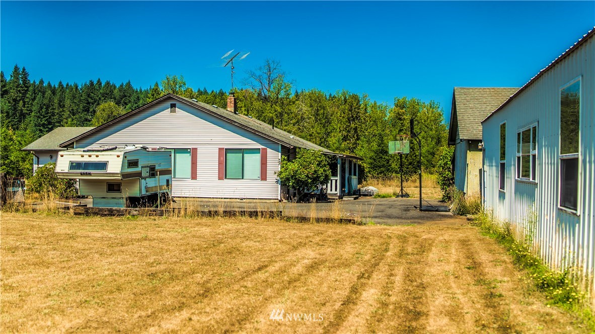 146 Mauerman Road North Chehalis, WA 98532 - Photo 12 of 40 a view of a house with patio outdoor seating area