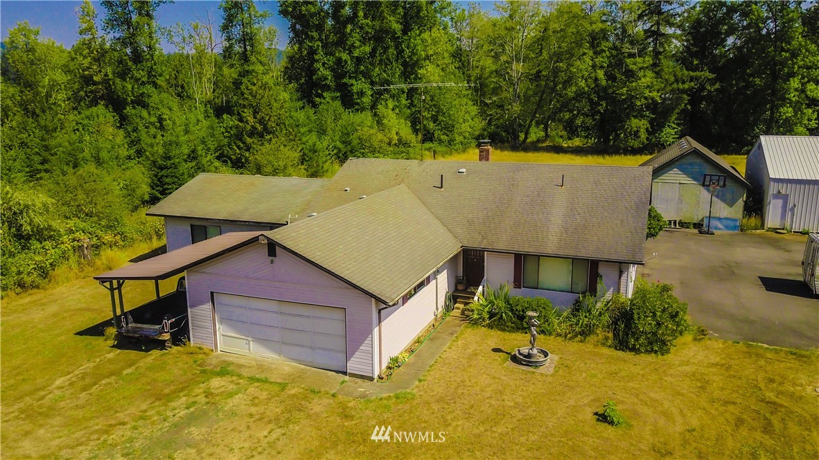 146 Mauerman Road North Chehalis, WA 98532 - Photo 5 of 40 an aerial view of a house with yard table and chairs