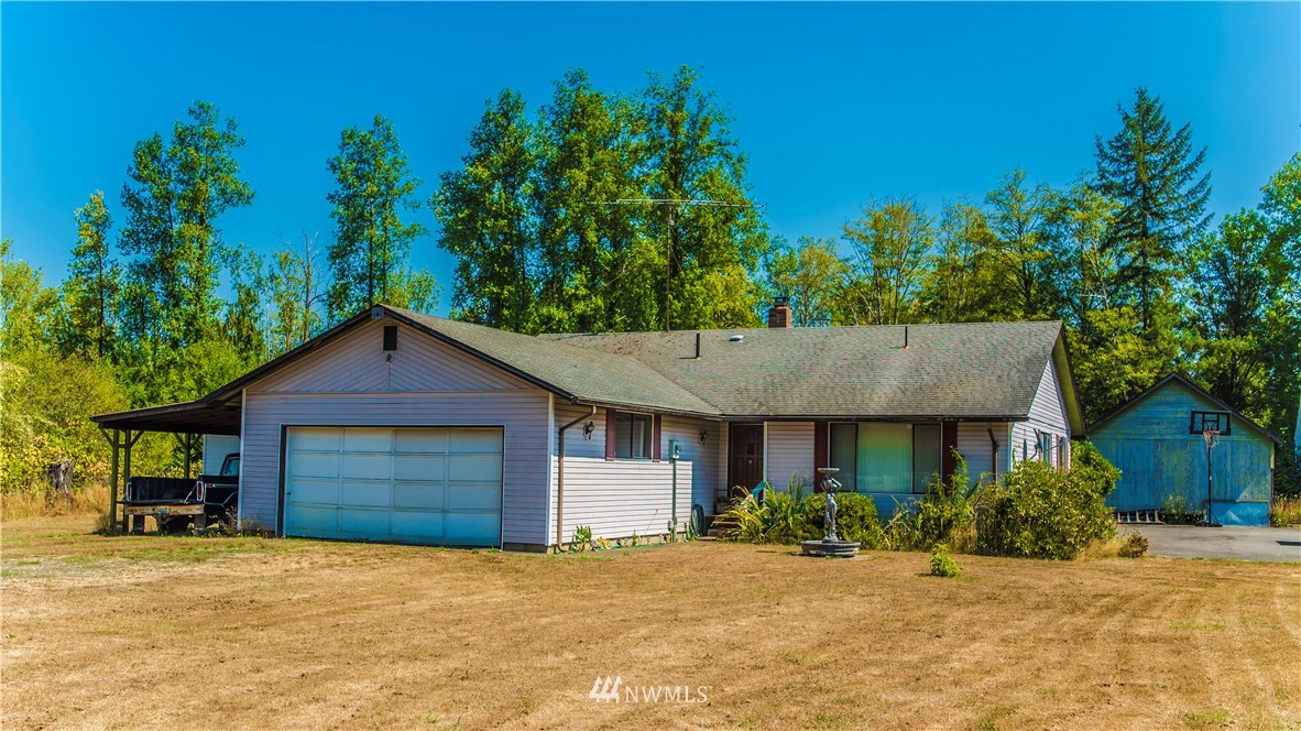 146 Mauerman Road North Chehalis, WA 98532 - Photo 8 of 40 a front view of a house with a yard and potted plants
