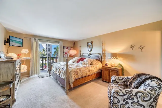 a spacious bedroom with a bed and window