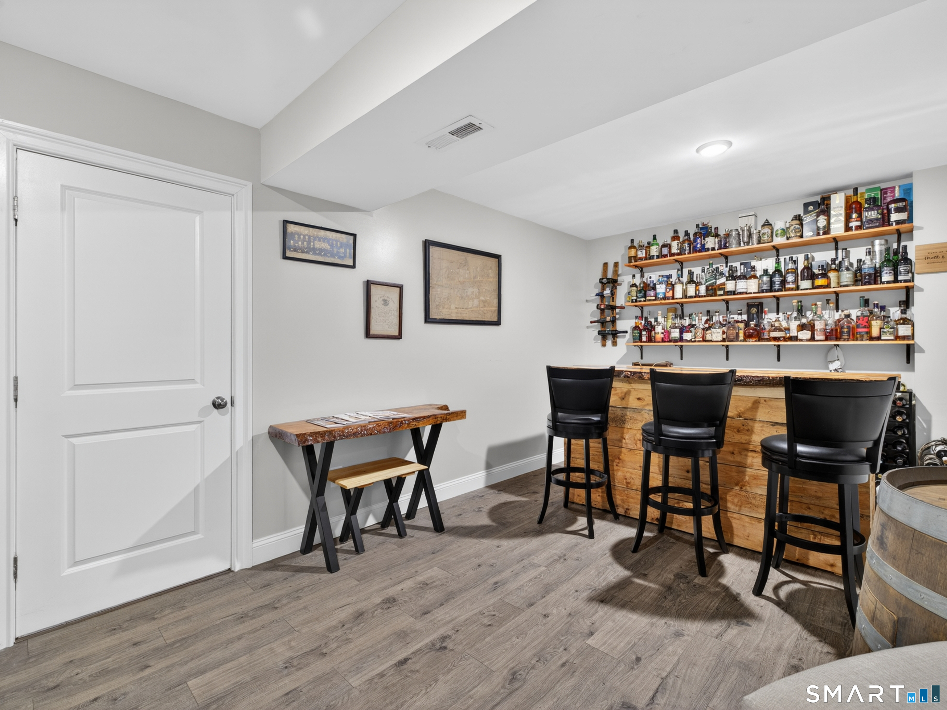 34 Village Crossing, Unit 34 Niantic, CT 06357 - Photo 4 of 38 a workspace with furniture and wooden floor
