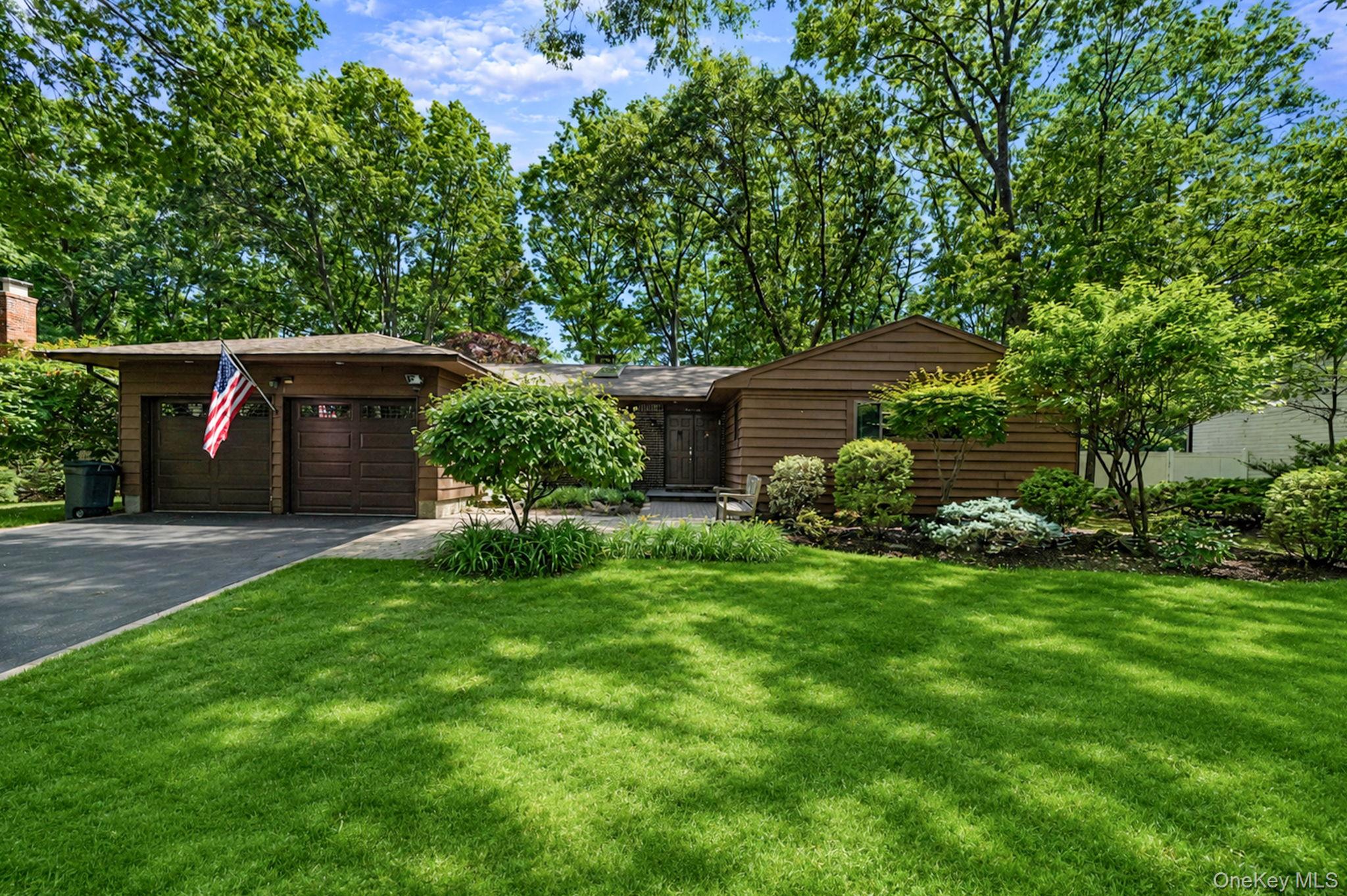 a house view with a garden space
