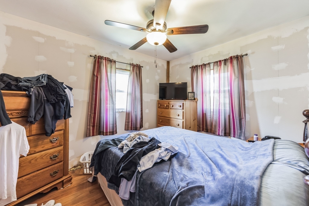 394 James Street Chicopee, MA 01020 - Photo 11 of 15 a bedroom with a bed and a television