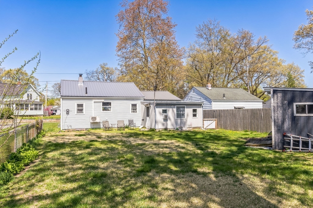 394 James Street Chicopee, MA 01020 - Photo 15 of 15 a front view of a house with a yard