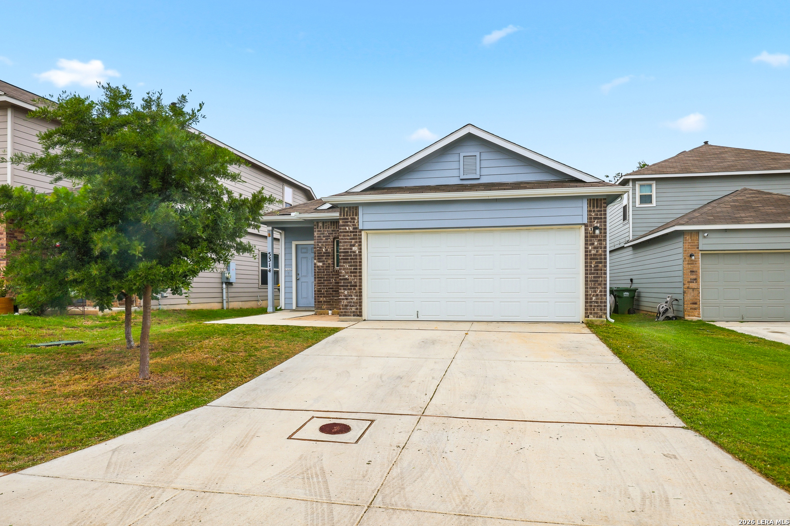 5314 Riley Way St. Hedwig, TX 78152 - Photo 1 of 26 a front view of house with yard