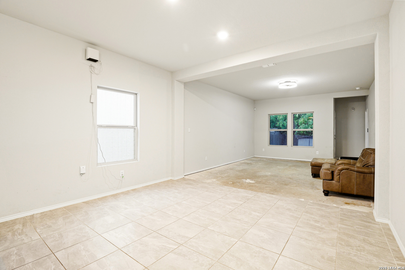 5314 Riley Way St. Hedwig, TX 78152 - Photo 13 of 26 an empty room with windows