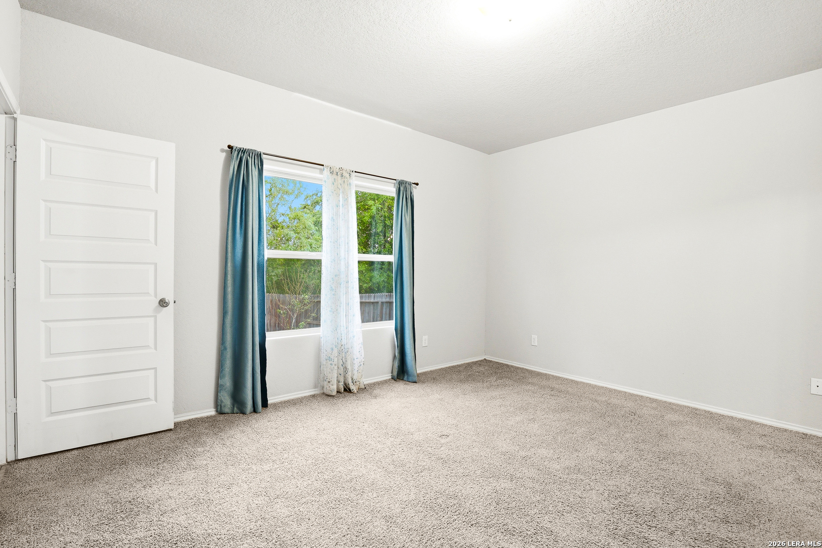 5314 Riley Way St. Hedwig, TX 78152 - Photo 22 of 26 an empty room with a window