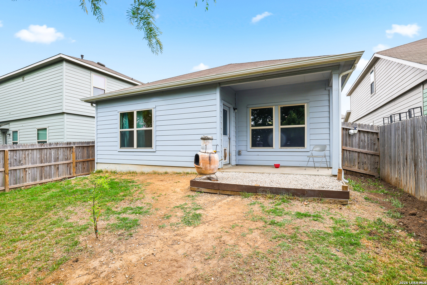 5314 Riley Way St. Hedwig, TX 78152 - Photo 24 of 26 a view of a house with backyard and sitting area