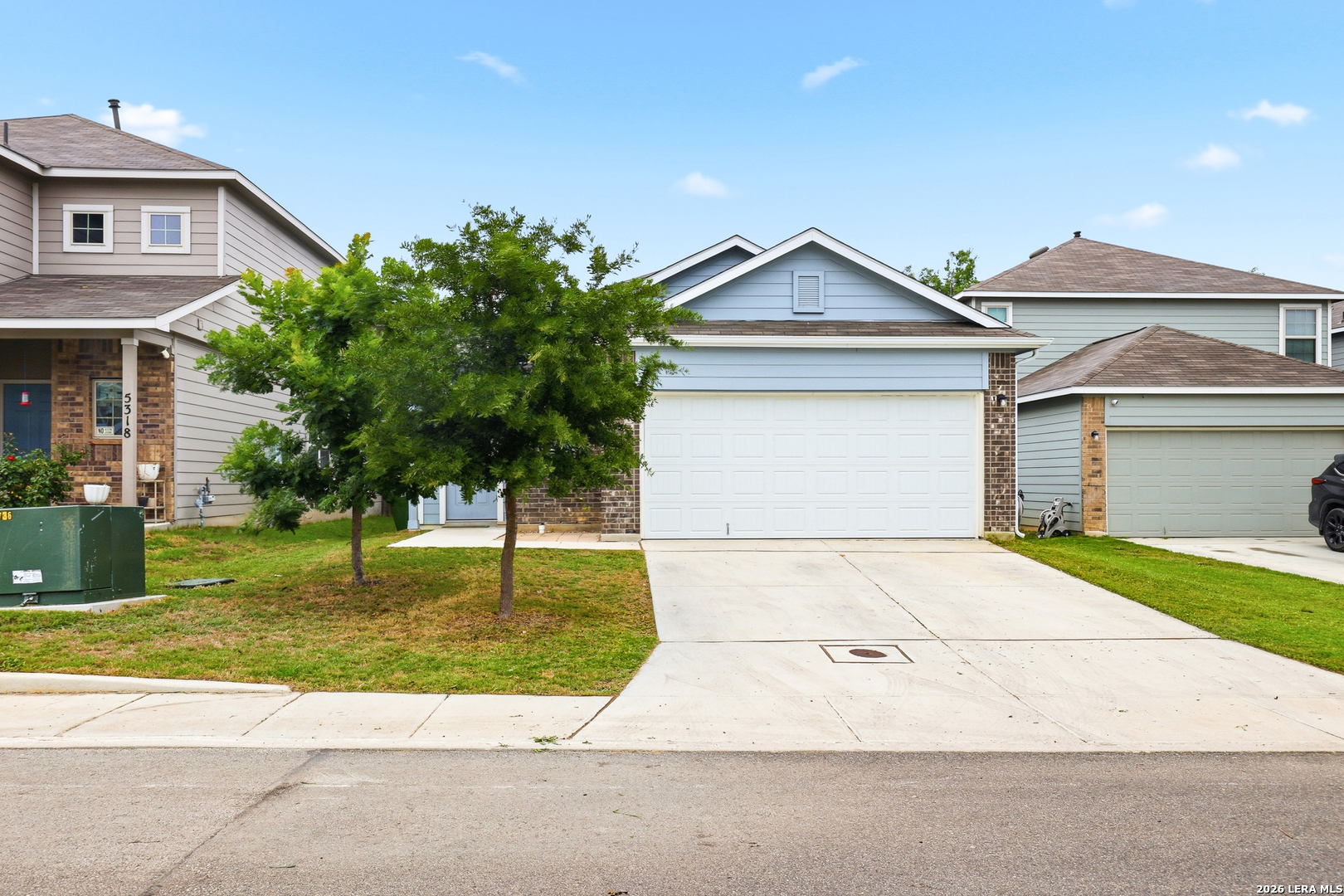 5314 Riley Way St. Hedwig, TX 78152 - Photo 3 of 26 a view of a house with a yard