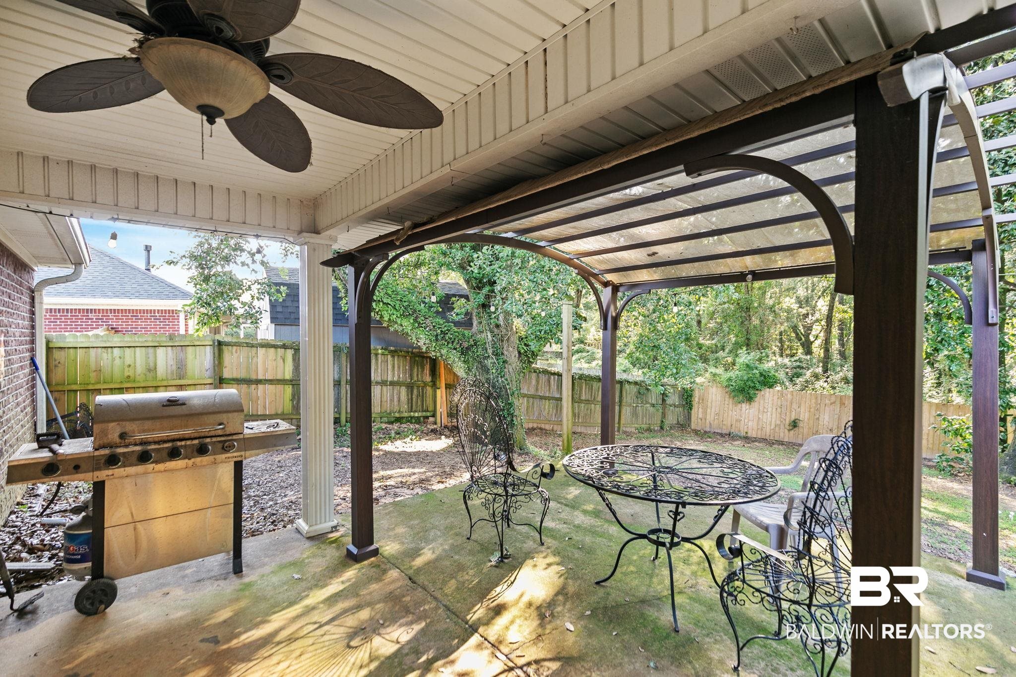 10550 Patrick Avenue Grand Bay, AL 36541 - Photo 41 of 43 View of patio featuring ceiling fan and grilling area