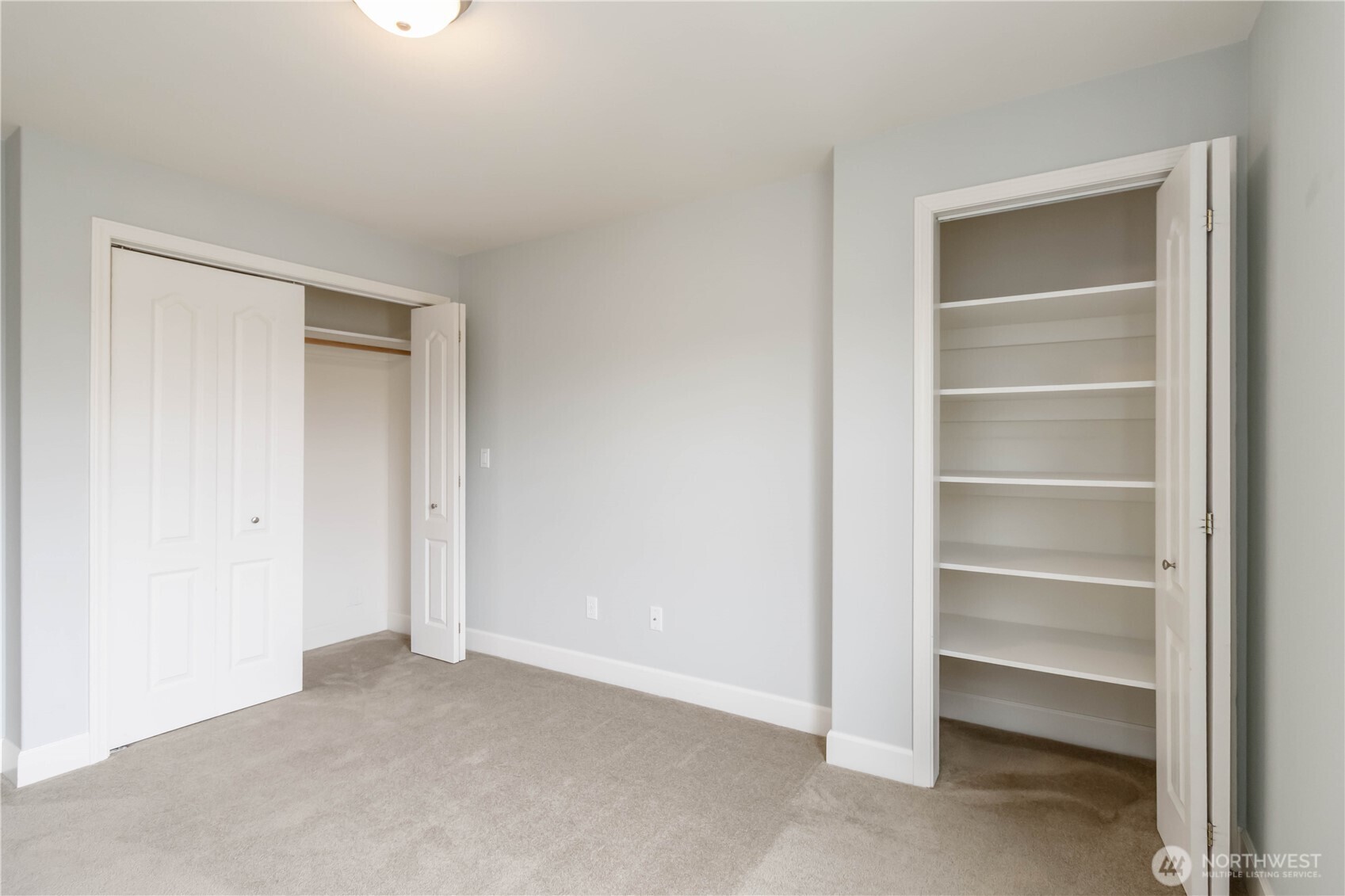 1548 River Road, Unit 302 Longview, WA 98632 - Photo 13 of 37 a view of an empty room with a closet