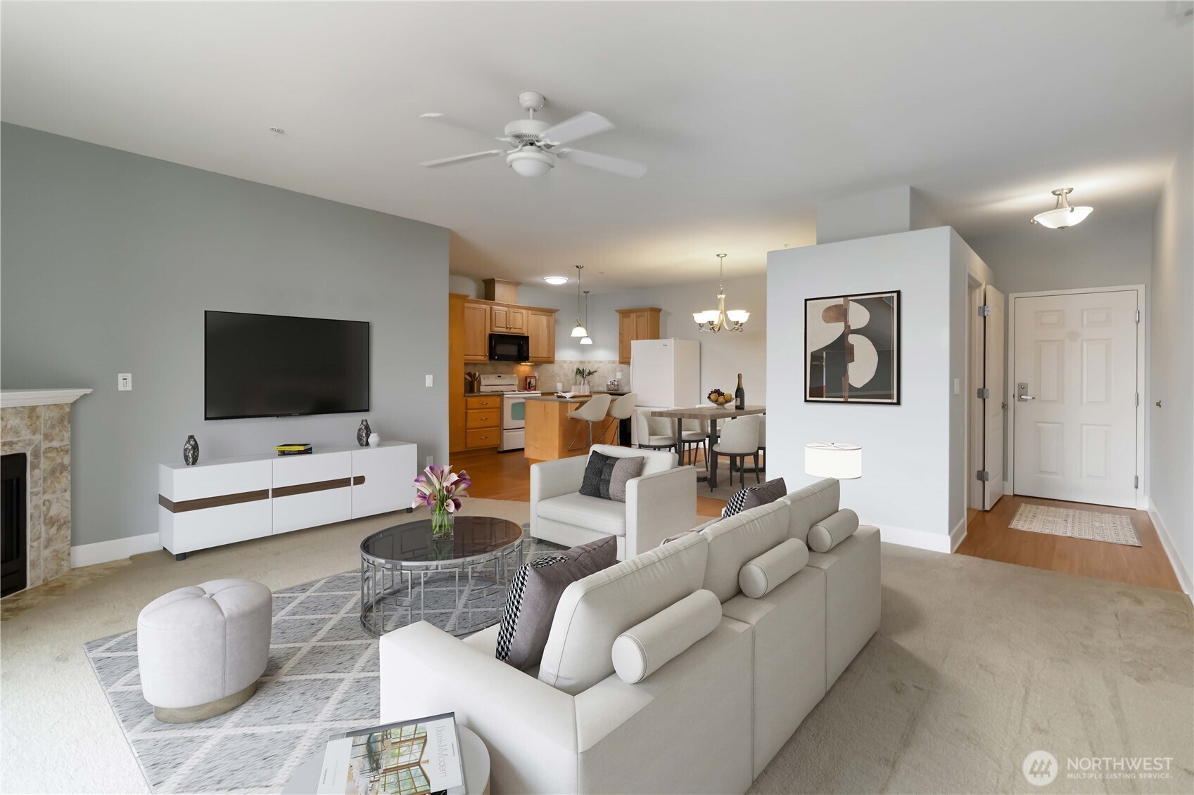 1548 River Road, Unit 302 Longview, WA 98632 - Photo 4 of 37 a living room with furniture and a flat screen tv