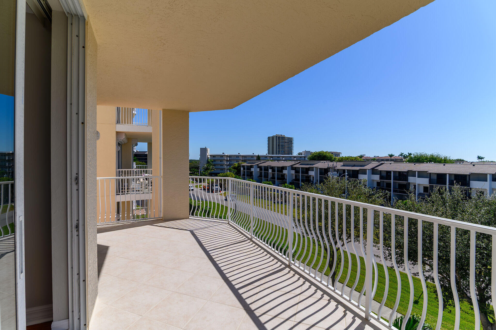 1111 Swallow Avenue, Unit 1401 Marco Island, FL 34145 - Photo 20 of 36 a balcony with a city view