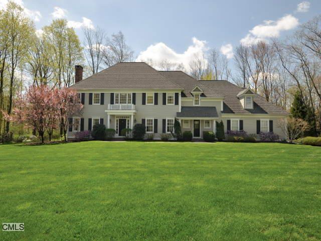 50 Ivy Hill Road Ridgefield, CT 06877 - Photo 1 of 1 a front view of a house with a garden