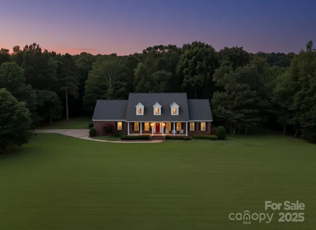 a view of a house with a big yard