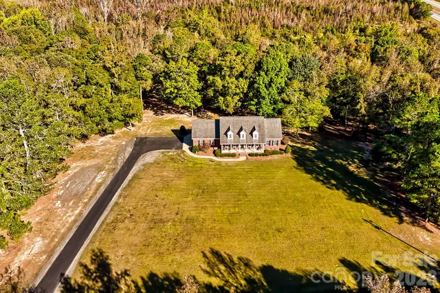a view of a swimming pool and an outdoor seating