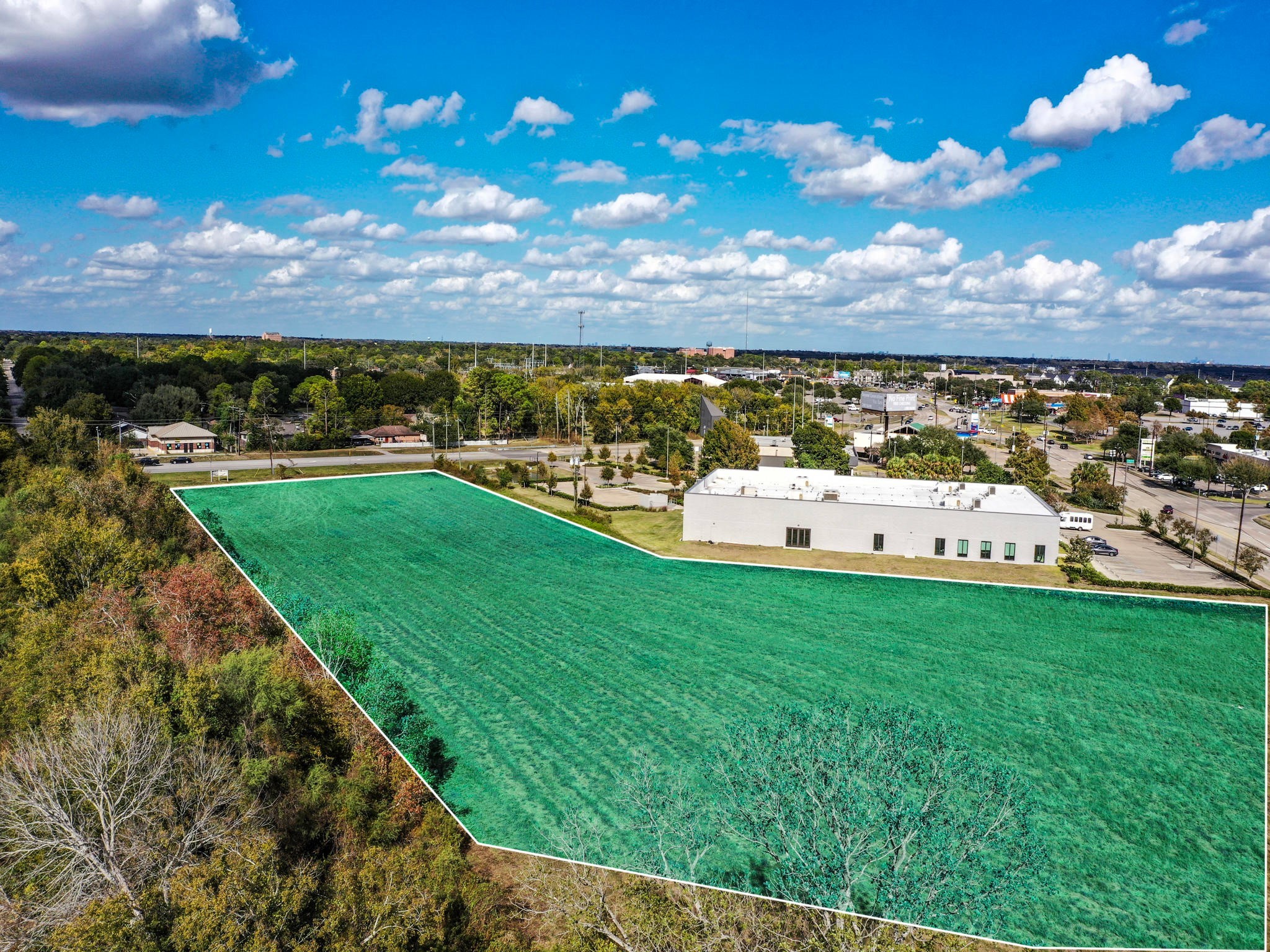 0 FM 2218 Road Richmond, TX 77469 - Photo 3 of 33 a view of a lake with a city
