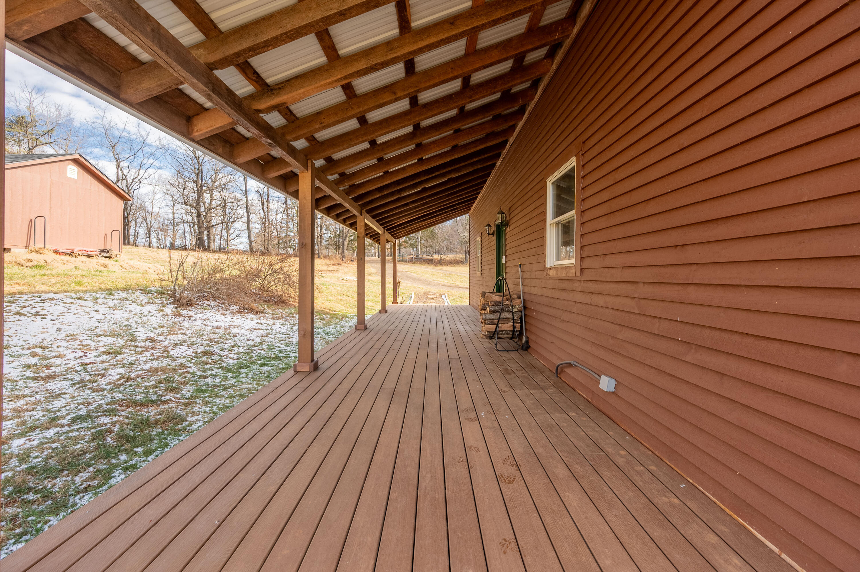 1133 Countyline Church Road Southeast Floyd, VA 24091 - Photo 13 of 97 a view of a balcony with wooden floor