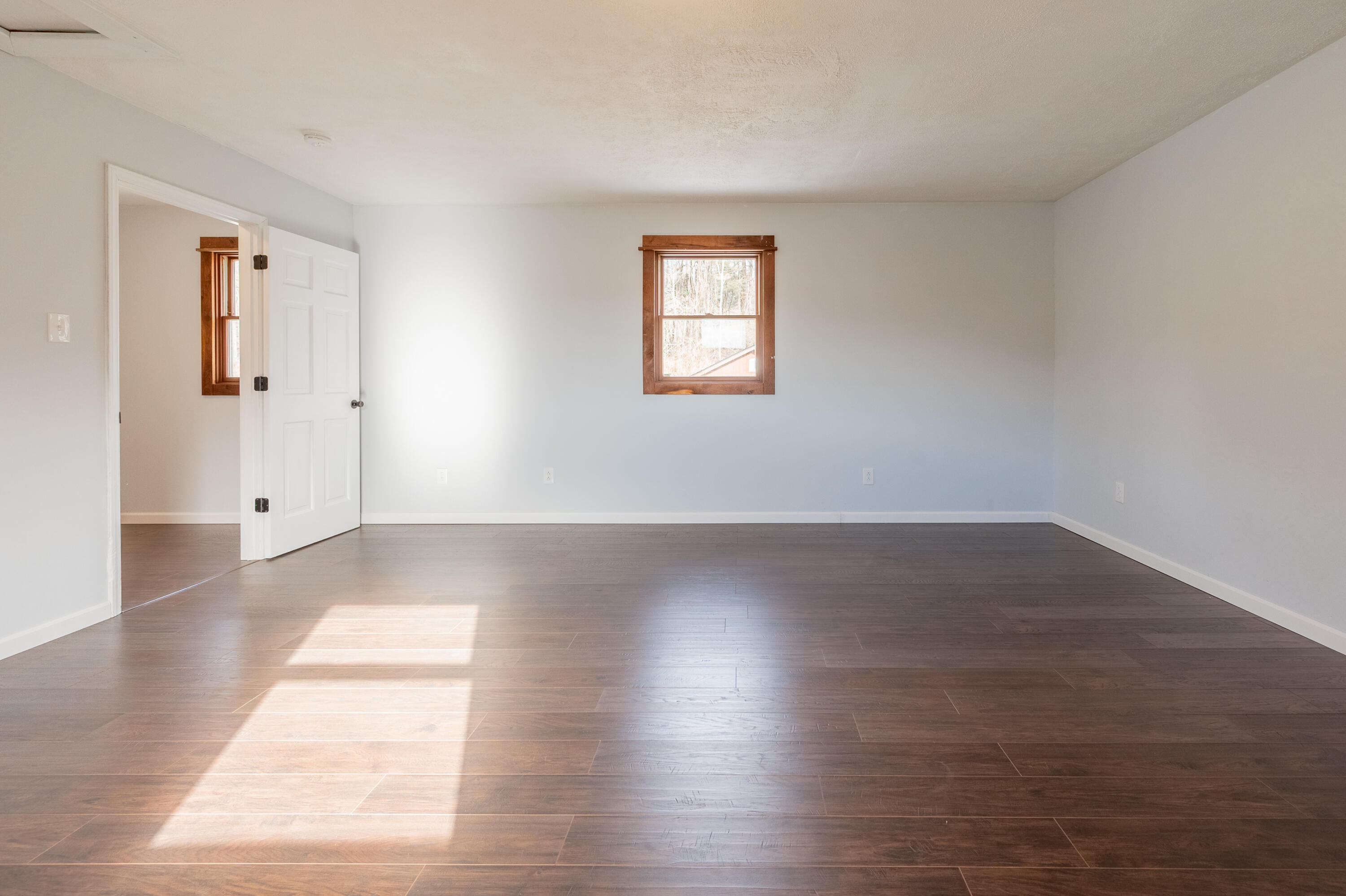 1133 Countyline Church Road Southeast Floyd, VA 24091 - Photo 55 of 97 a view of a hallway with wooden floor and a window