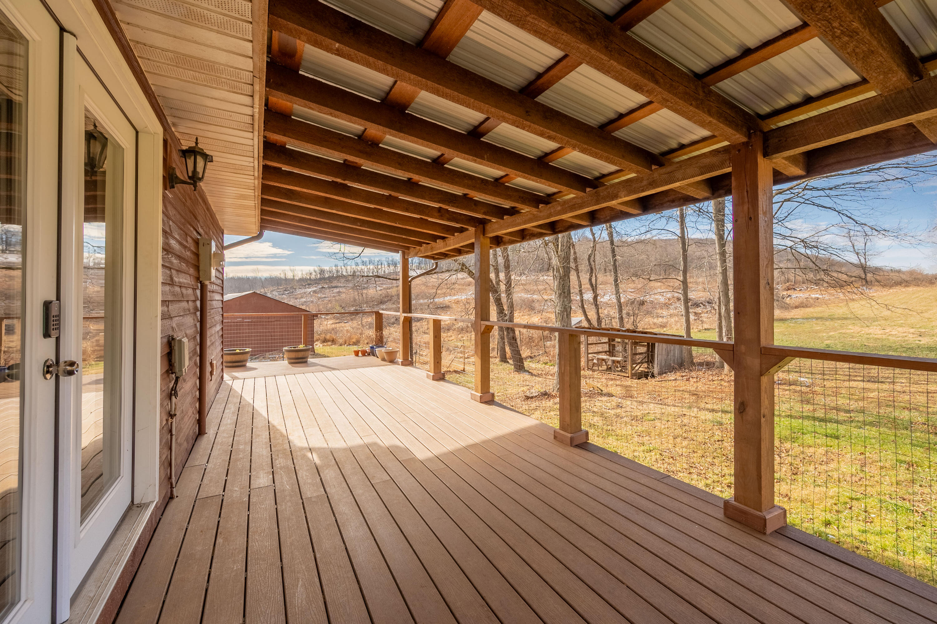 1133 Countyline Church Road Southeast Floyd, VA 24091 - Photo 62 of 97 a view of a balcony with wooden floor