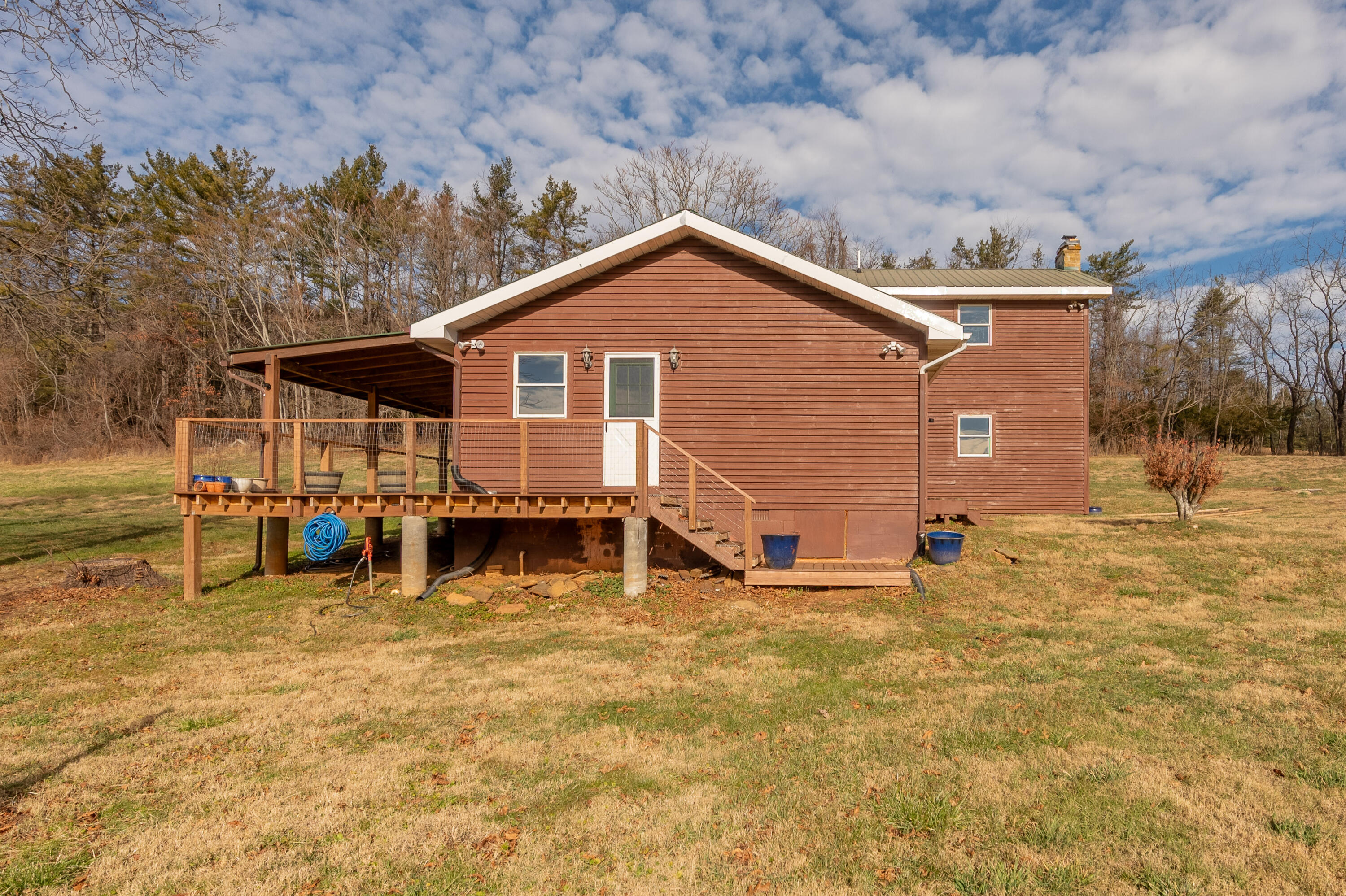 1133 Countyline Church Road Southeast Floyd, VA 24091 - Photo 69 of 97 a view of a house with a patio and a yard