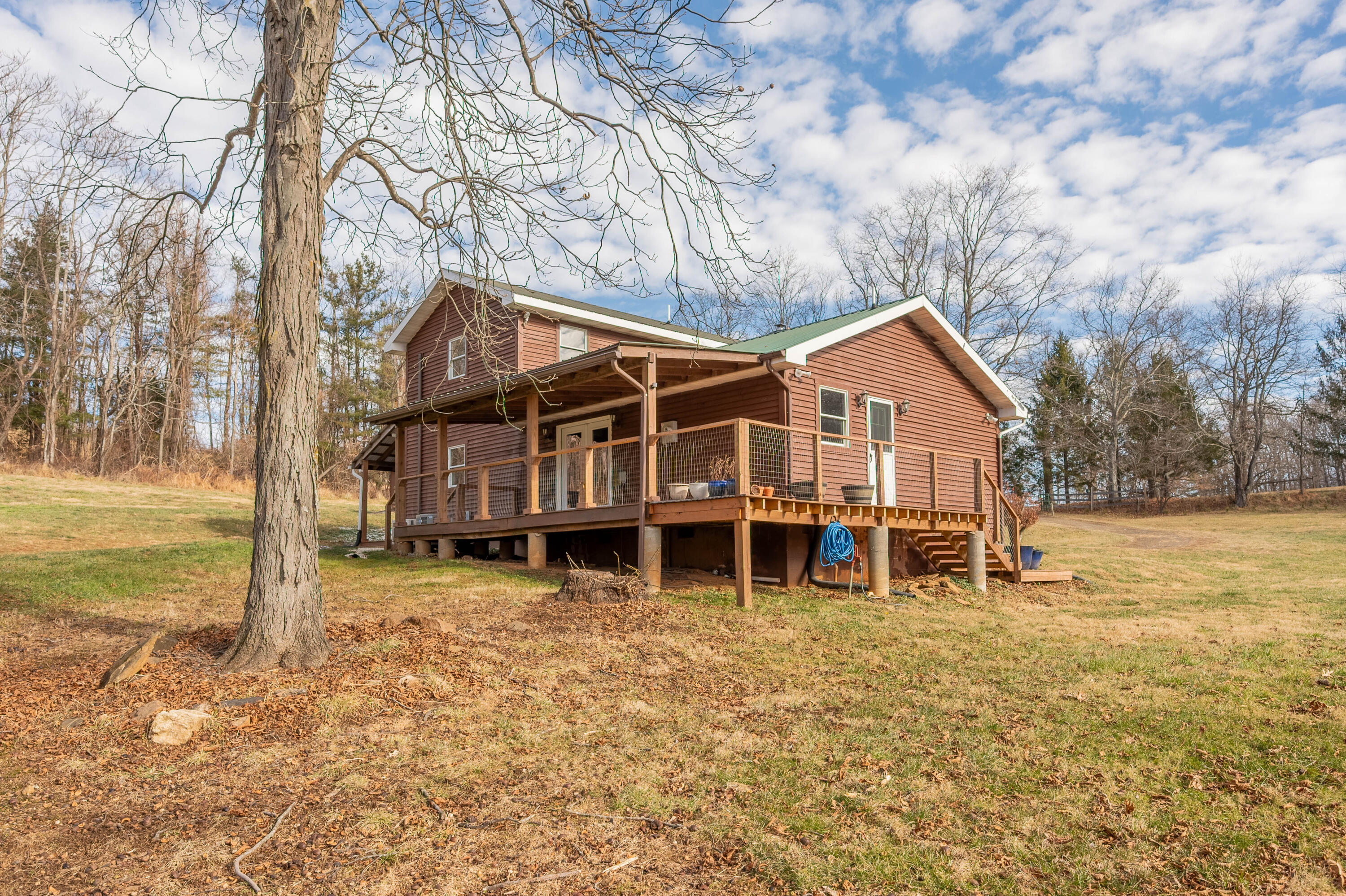1133 Countyline Church Road Southeast Floyd, VA 24091 - Photo 75 of 97 a view of a house with backyard porch and sitting area