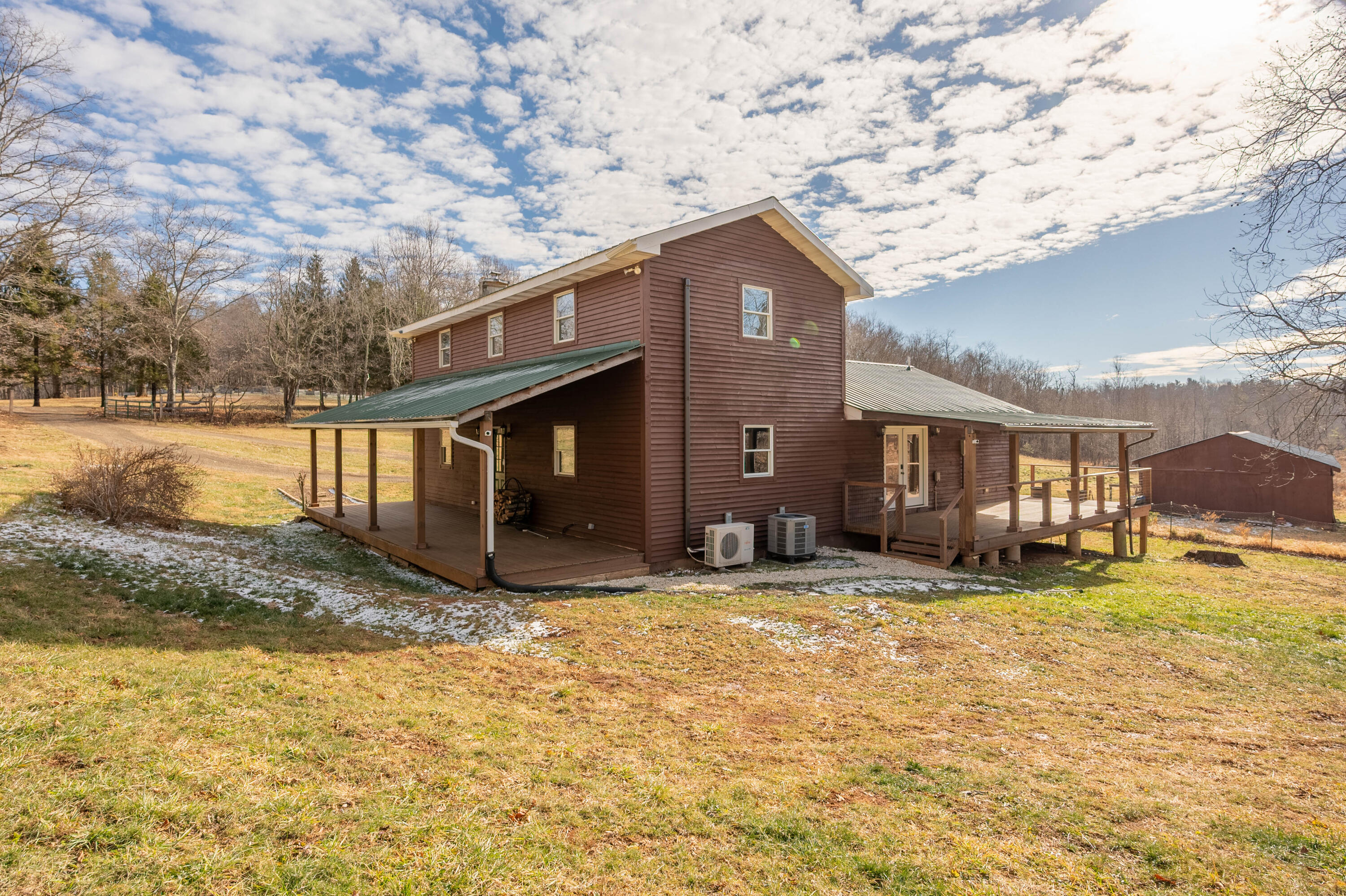 1133 Countyline Church Road Southeast Floyd, VA 24091 - Photo 10 of 97 a view of a house with backyard porch and sitting area