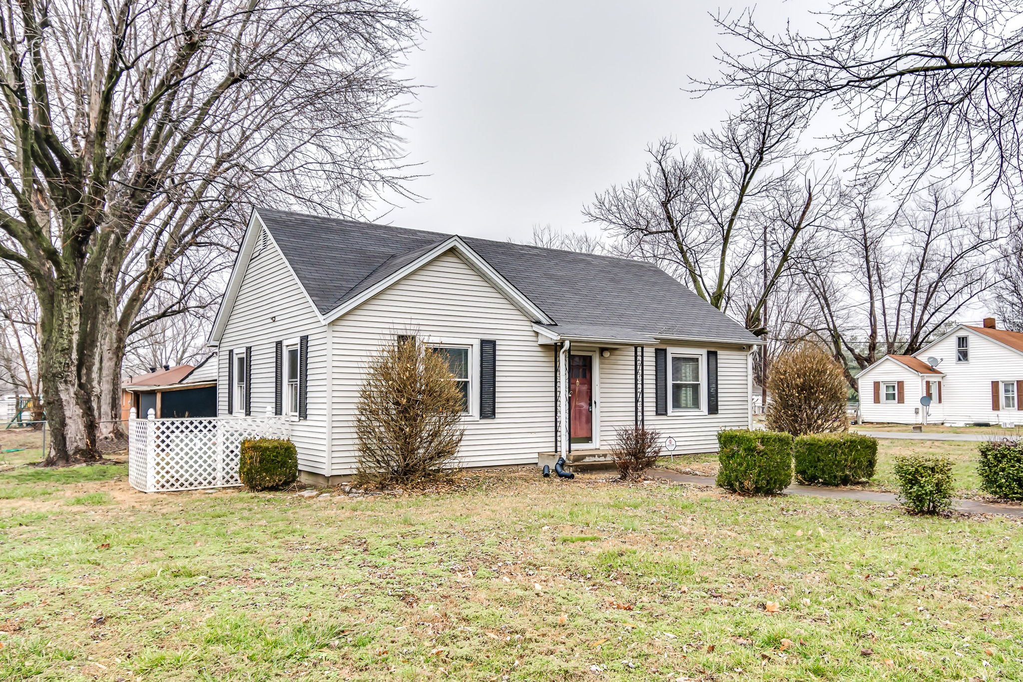 404 Gibson Street Portland, TN 37148 - Photo 2 of 11 a front view of a house with garden