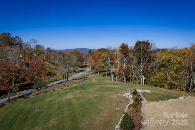 a view of a road with a yard