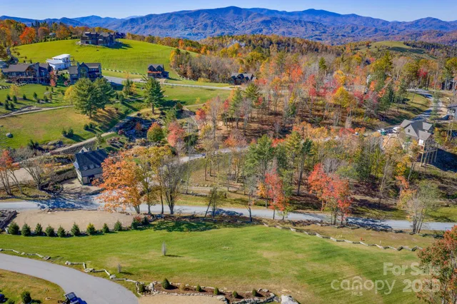 a view of a city with mountains in the background