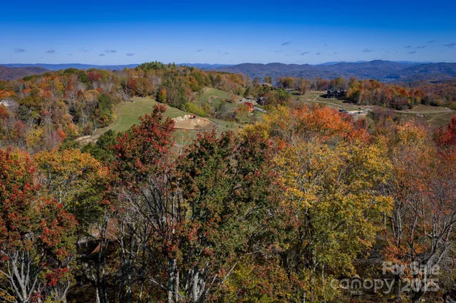 a view of a city with mountains in the background