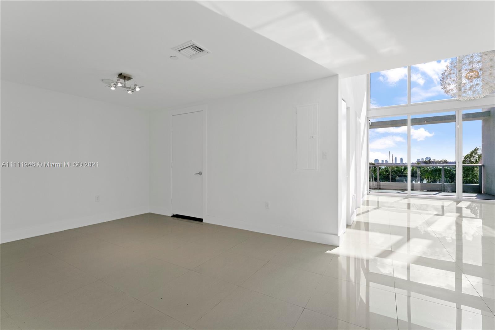 900 Biscayne Boulevard, Unit 507 Miami, FL 33132 - Photo 10 of 20 wooden floor in an empty room