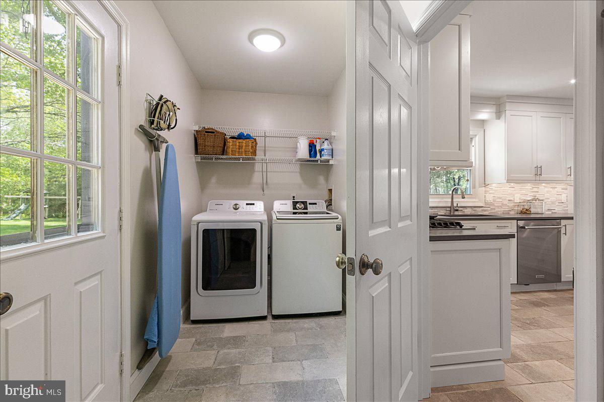3 Strathmore Place Princeton Junction, NJ 08550 - Photo 14 of 29 a kitchen with stainless steel appliances granite countertop a refrigerator and a sink