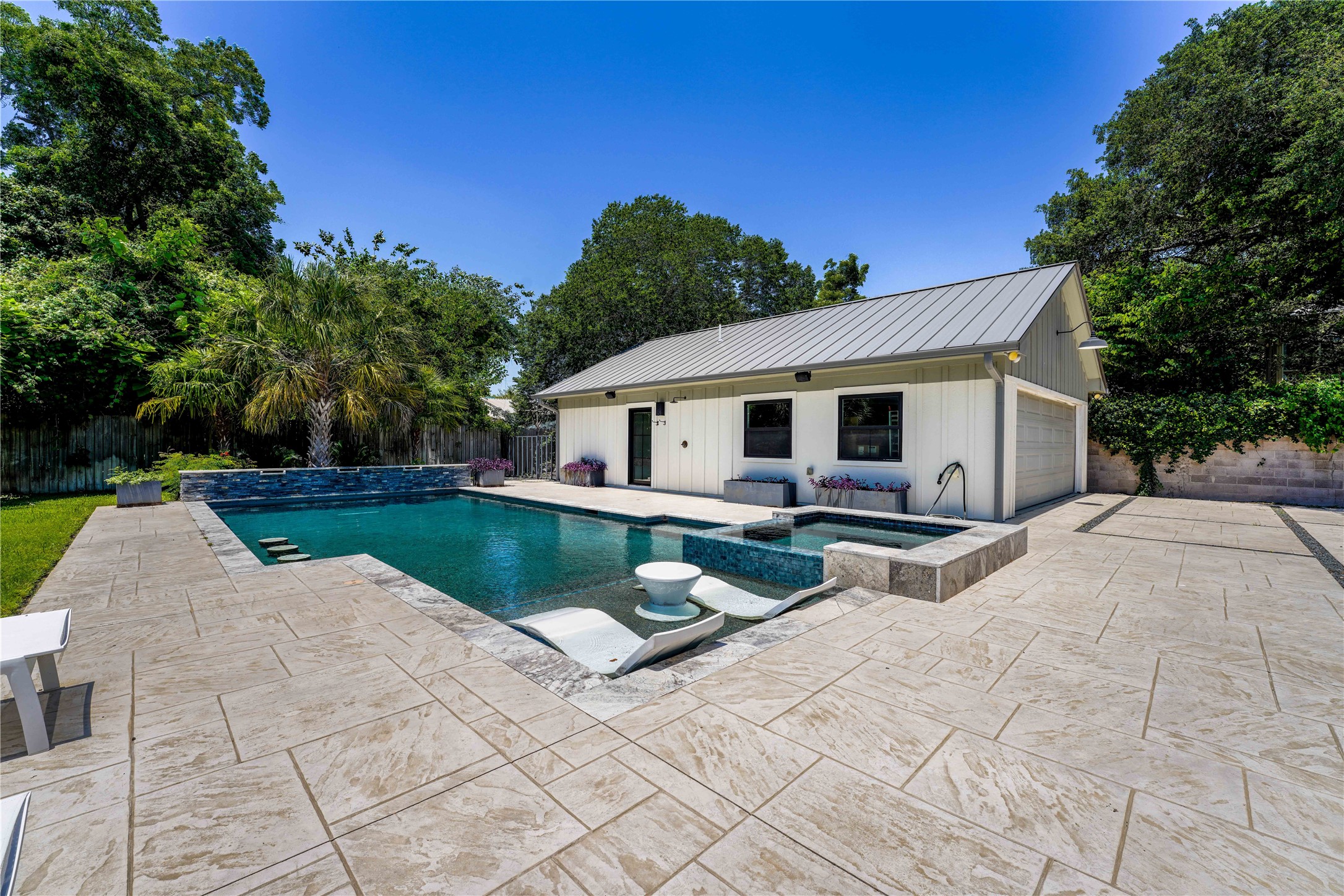 1124 Bowie Street Columbus, TX 78934 - Photo 25 of 28 a view of house with swimming pool and yard with green space