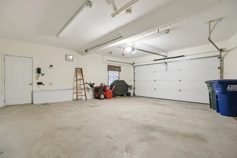 a view of a livingroom with storage and utility